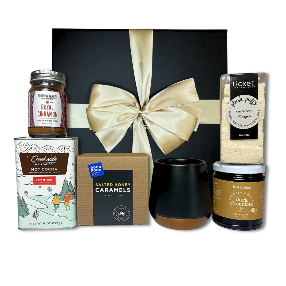 executive Christmas client cocoa gift box include a luxury double walled trendy mug, artisan marshmallows, chocolate sauce, drinking chocolate, royal cinnamon, caramels and northwest biscotti made in Washington.