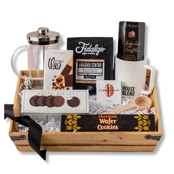 house blend gift basket includes a wooden tray, pound of organic coffee, mug, cookies, coffee scoop, coffee candy and coffee gum.  Apple Blossom Gift Baskets Made in Washington