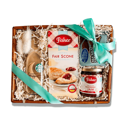 Washington scone basket includes a box f signature Fisher scone mix, Fisher scone jam, Starbucks Frappuccino, and chocolate grahams