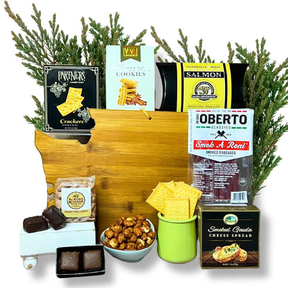 Washington Snack Board gift basket features products made in Washington and comes with a Washington state shaped bamboo cutting board, smoked salmon, cookies, crackers, chocolate caramels and candied nuts. Apple Blossom Gift Baskets