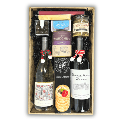 made in Washington wine and snack tray in a wooden tray the high end gift includes pinot gris, cabernet sauvignon, crackers, cheese, smoked muscles, wine chips, sea salt caramels, peppermint bark and other snacks