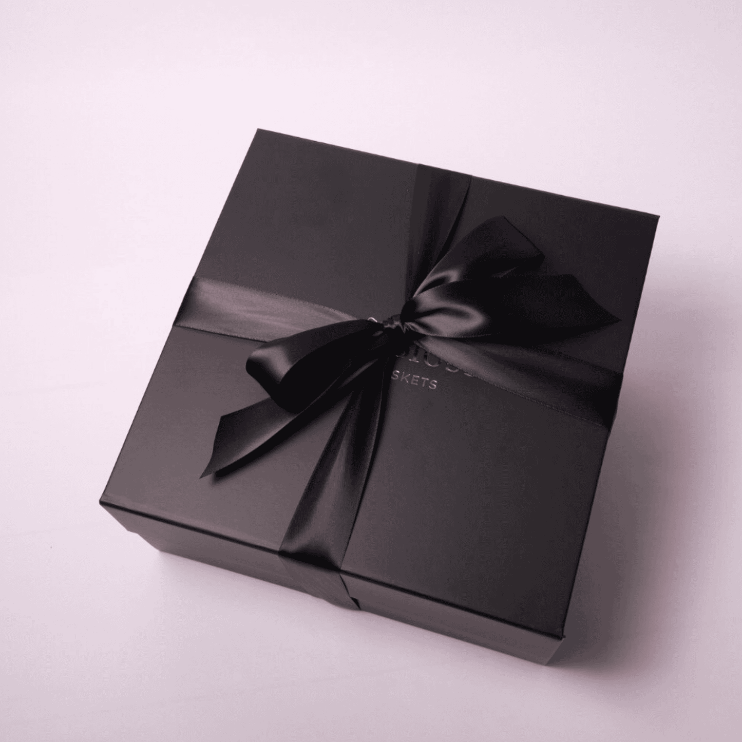 Our signature black gift box with a soft-touch finish and magnetic closure, elegantly designed for corporate gifts, client appreciation, and special occasions. Perfect for presenting luxury and unique gifts in a sleek, professional style.