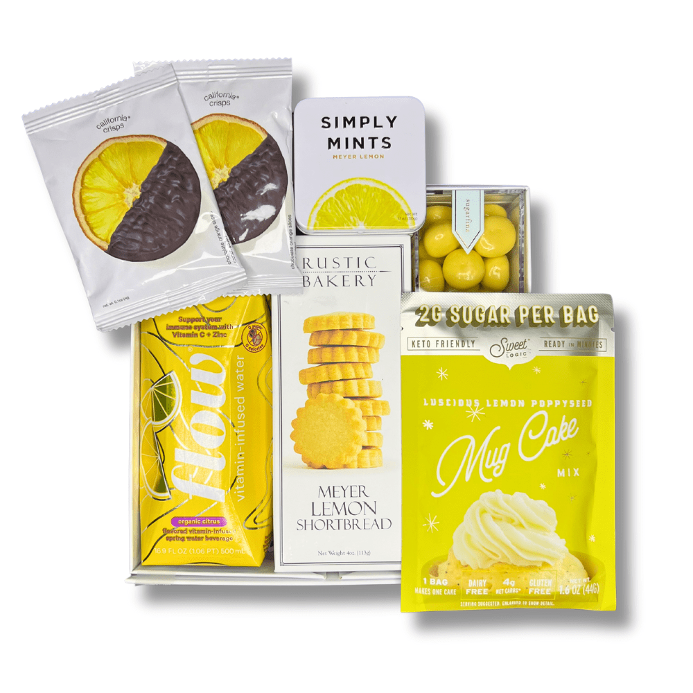 cheerful delights yellow treat gift box includes, lemon mug cake, lemon cookies, lemon water, mints, candy cube and dried lemon slices