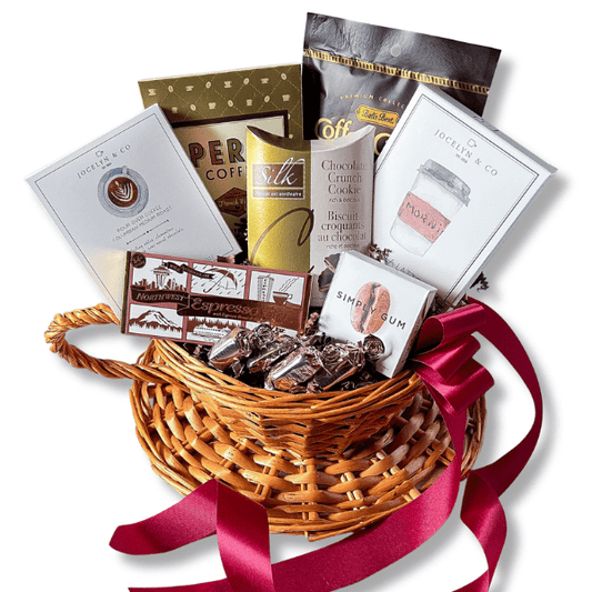 Coffee Lovers Gift Baskets includes: gourmet coffee, espresso chocolate bar, coffee gum, Seattle chocolate espresso truffles, mug cake, cookies and coffee candy all assembled in a wicker coffee cup basket made in Washington by Apple Blossom Gift Baskets 