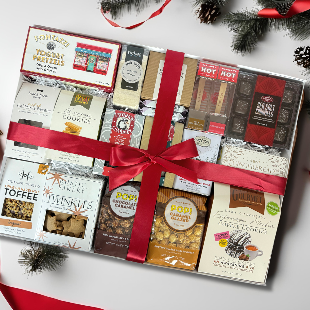 deluxe sweet charcuterie gift box is a giant gift box loaded with popcorn, cookies, toffee, chocolates, candied nuts, yogurt pretzels and more.  Great for a family or for people to share.