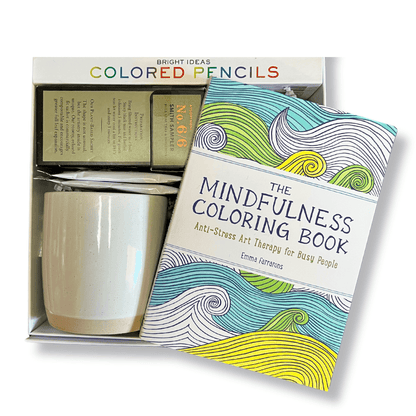 thoughtful and mindful gift box with mindfulness adult coloring book, coloring pencils, tea, ceramic mug and crispy chocolate oranges.  A great gift box to relax by Apple Blossom Gift Baskets