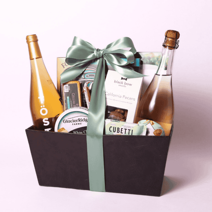 Elegant Non-Alcoholic Wine Basket with TÖST White Tea, Florentina Sparkling Spritz, made-in-WA cheese, smoked salmon, nuts, and water crackers—perfect for special celebrations.