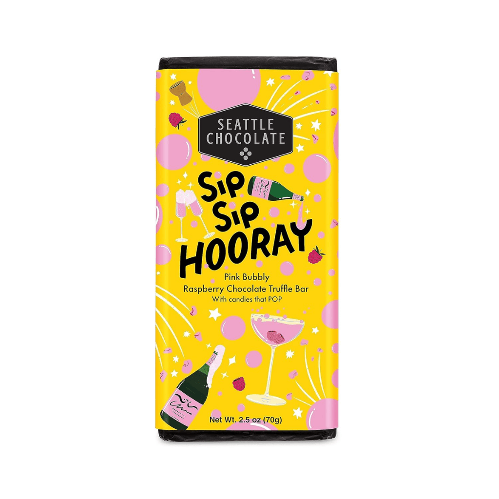 Seattle chocolate sip sip hooray truffle bar is a pink bubbly raspberry chocolate truffle bar with candies that pop inside.