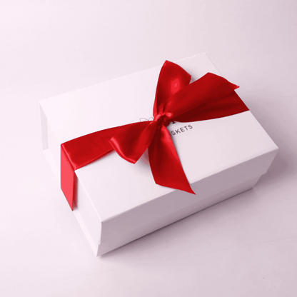 Cookies come in a soft touch white gift box with a satin hand tied bow, perfect for corporate gifts, holiday gifts, client gifts, or special occasions. Elegant and ready for delivery, this luxurious box makes a beautiful presentation for any gift.